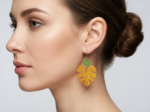 Monstera Dangle Earrings - Orange on model